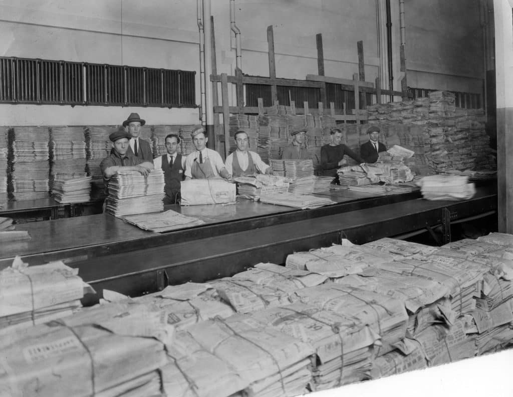 Old image of workers at newspaper factory
